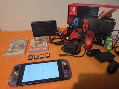 Nintendo Switch With Three Controllers And 6 Games.