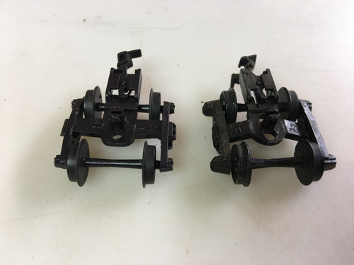 Tyco Pair of Trucks w/Black Wheels and Couplers HO Scale Trains