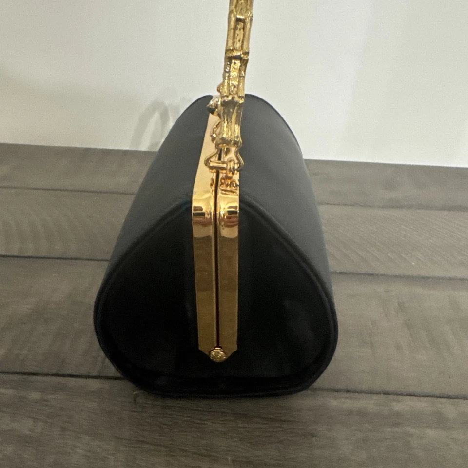 Cartera o bolso de mano vintage Ande’ negro con asa dorada Foto 4 de 4