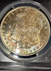 1885-O MORGAN SILVER DOLLAR PCGS MS62 RAINBOW GOLD BLUE ORANGE TONE TONING