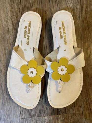 yellow daisy flip flops
