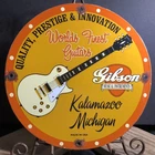 VINTAGE 1973 DATED GIBSON GUITAR MUSICAL INSTRUMENTS PORCELAIN SIGN OIL GAS