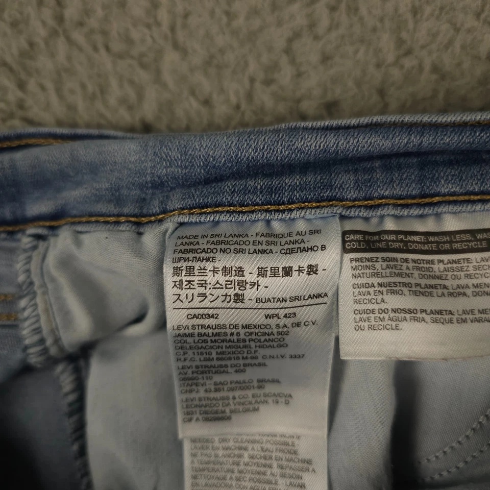 Levis Jean Shorts Women 33 Blue Shaping Bermuda Distressed Mid Rise Stretch FLAW - Image 4 of 4