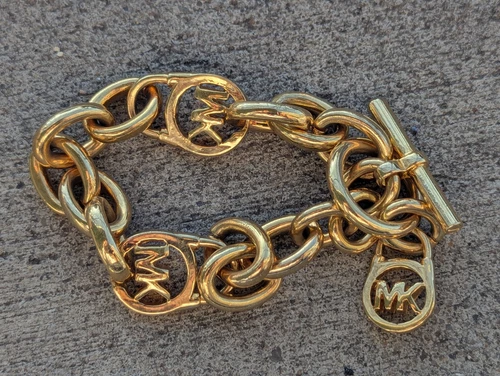 Bracciale Michael Kors Grosso Logo Toggle Link Catena Oro 8"