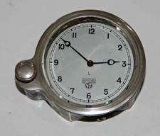 SMITHS VINTAGE CAR CLOCK. FRONT WIND BEVELLED GLASS RUNS WELL