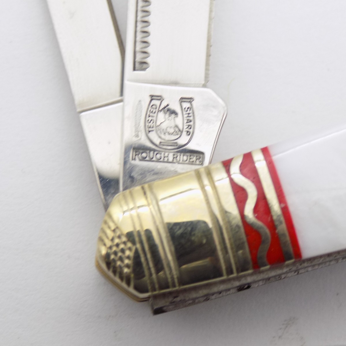 ROUGH RIDER White Pearl STOCKMAN RR990 Silver Select Red Inlay