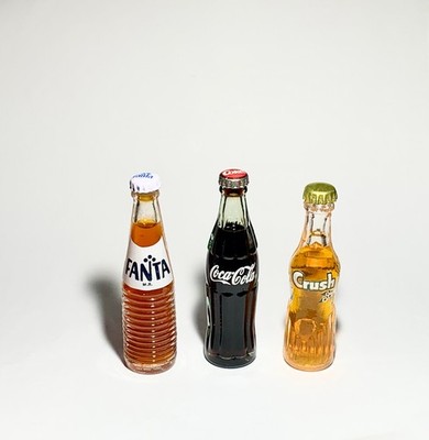 VINTAGE 3 MINIATURE SOFT DRINK BOTTLES OF FANTA, COCA-COLA, CRUSH MINT CONDITION