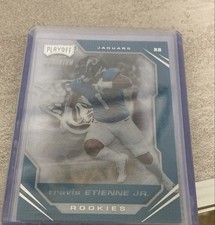 2021 Panini Chronicles - Playoff Momentum Rookies Travis Etienne #PMR-12 (RC)