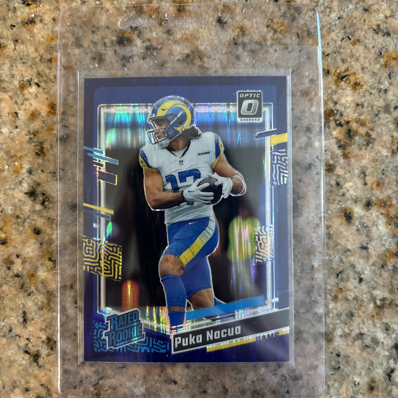 2023 Panini Donruss Optic - Rated Rookie Purple Shock Prizm #238 Puka Nacua (RC)