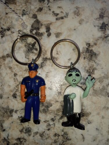 2 Homies keychains- Series 9 Alien Ese 1.75" tall rare ufo OOP mex & Policeman - Picture 1 of 2