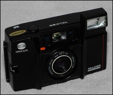Minolta "Talker" AF 35mm camera. Still talks and auto-load works. READ