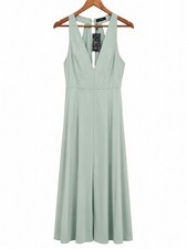 Elegant sage green maxi dress with a flattering deep V neckline.