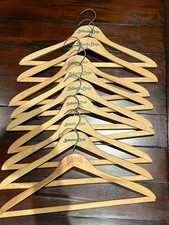 8 Vintage Sakowitz Bros. wooden hangers with 1 Battelsteins as a Bonus