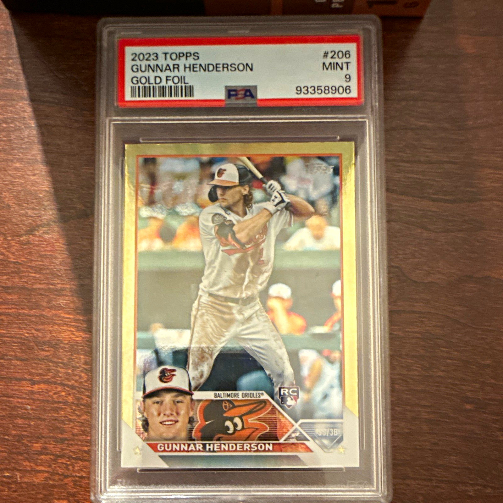 Topps 2023 Series 1 Gunnar Henderson #206 Gold Foil RC PSA 9 Orioles MLB view 1