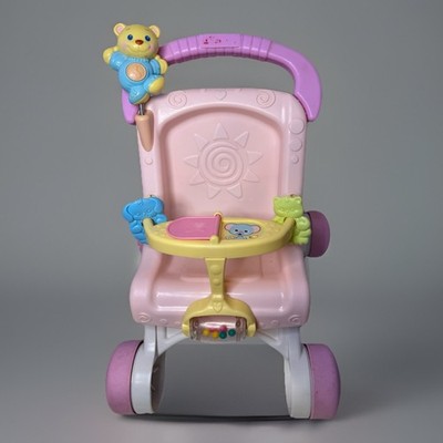 Fisher-Price Brilliant Basics Stroll-Along Walker Pink Baby Doll Stroller Toy