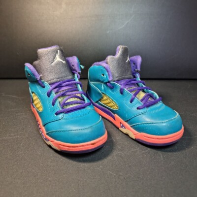 teal pink purple jordan 5s