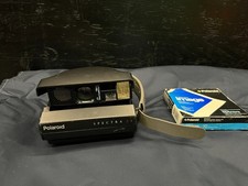 Vintage Folding Polaroid Spectra System SE Instant Camera. Includes Box of Film.