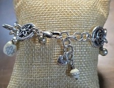 Silvertone Brighton Charm Floral & Beige Tab ...