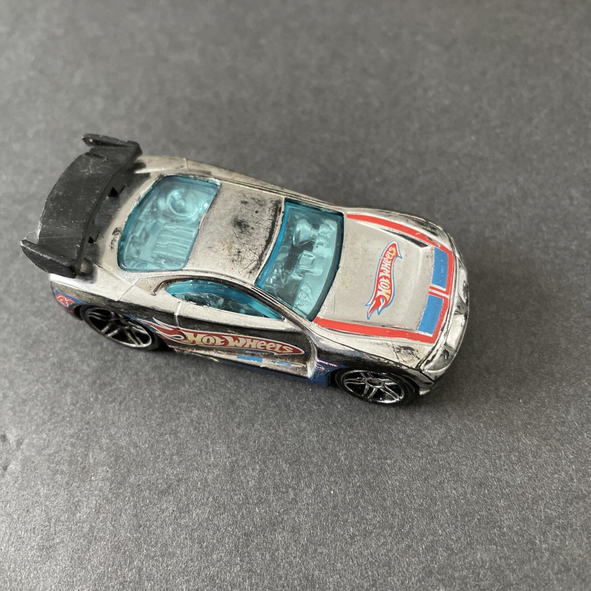 2009 Hot Wheels Power Rage Super Jump Raceway Silver  Chrome Diecast Car  40