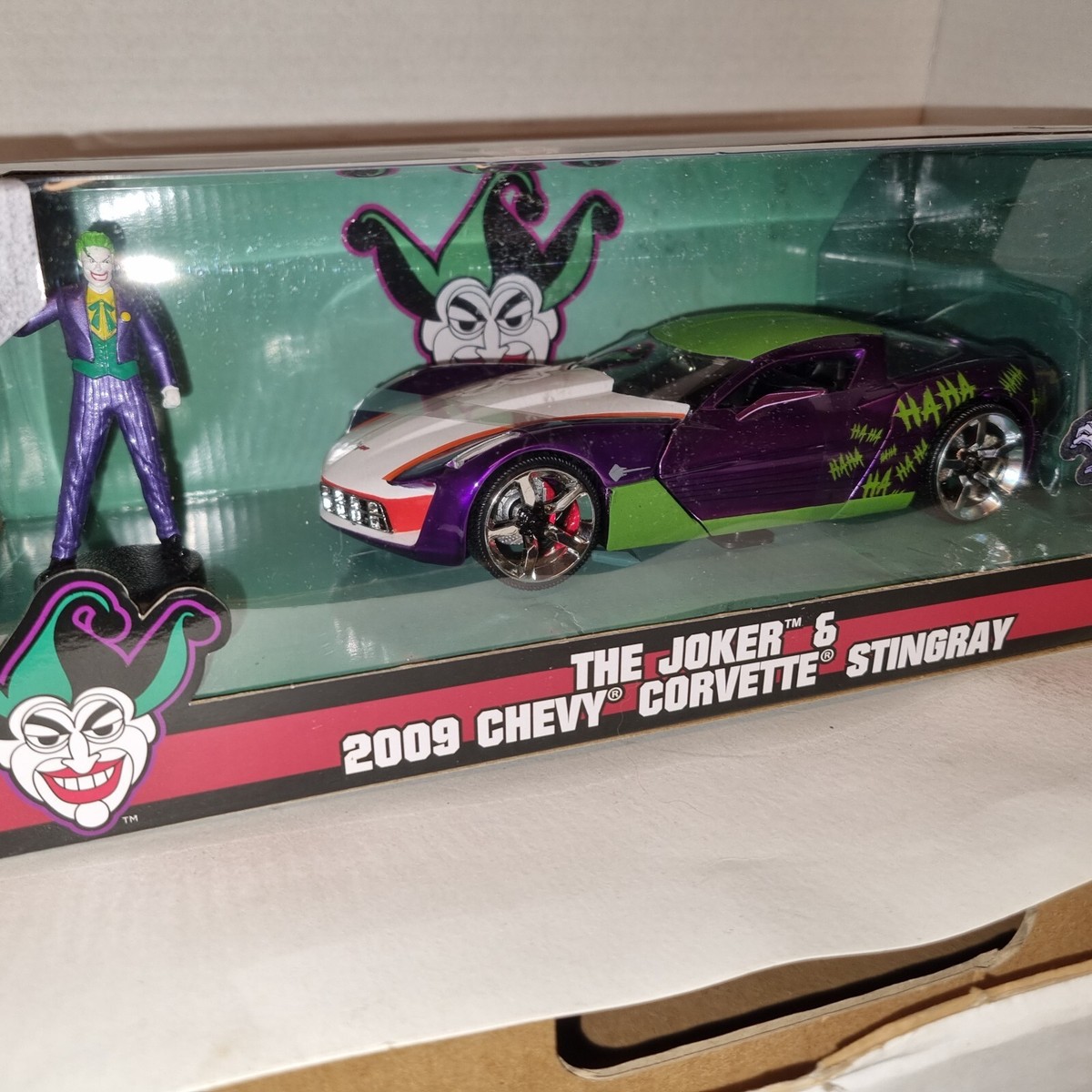 ミニカー The Joker 2009 Chevy Corvette Stingray Amazon.com: Jada Toys DC Comics 1:32 The Joker's 2009 Chevy