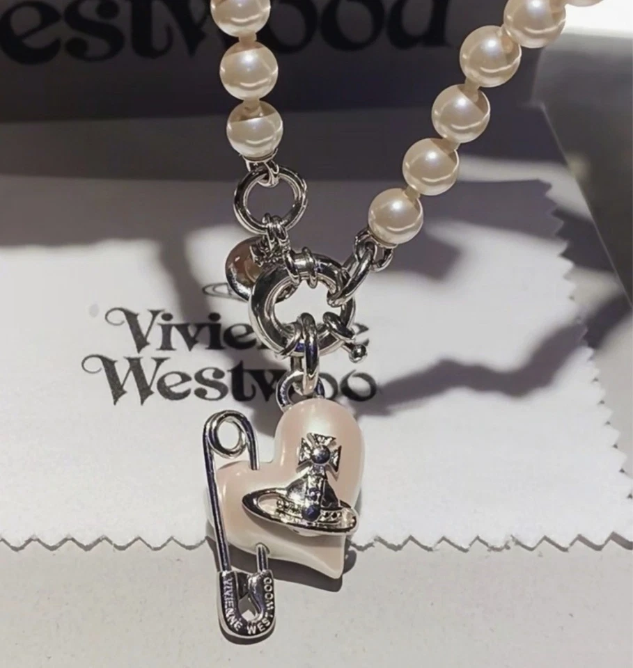 Collar gargantilla orbe de plata con colgante de corazón de pasador perla perforada usado Foto 3 de 4