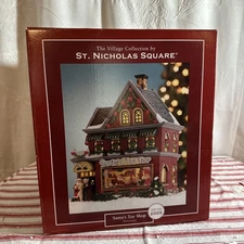 St Nicholas Square Santa Toy Shop Illuminated - Christmas Village Decoration