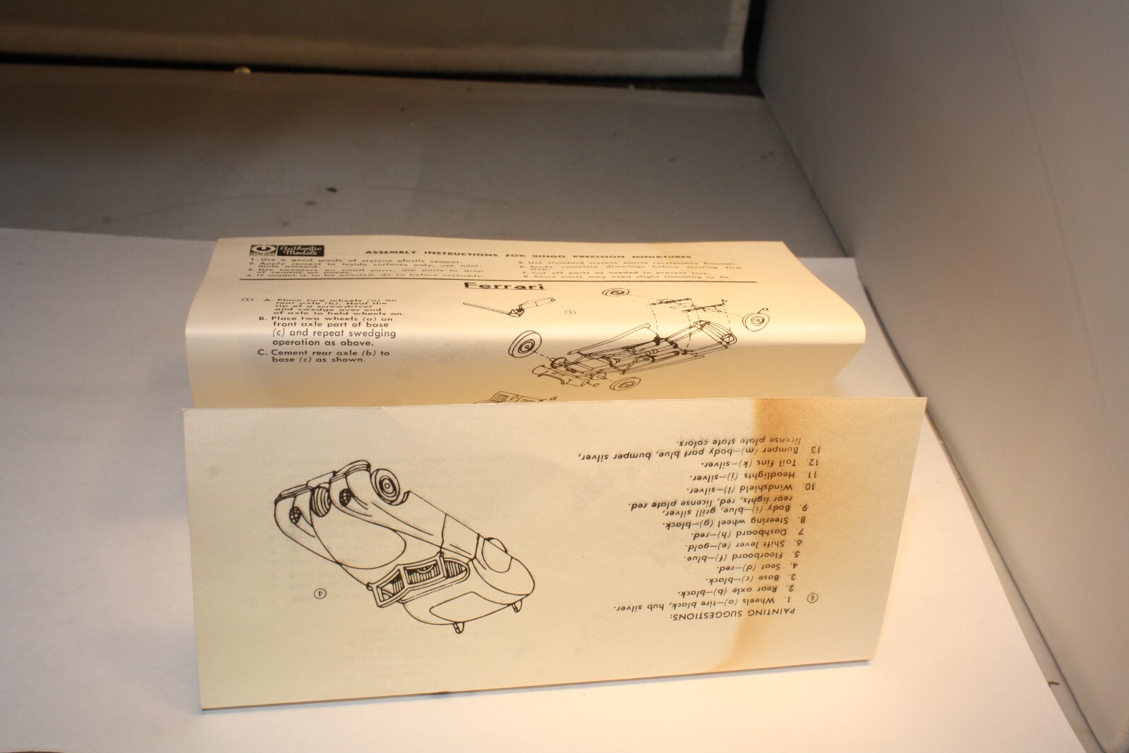 1950s Ferrari & Jaguar XK120 roadsters Ringo Toys box with detailed assembly instructions and illustrations.