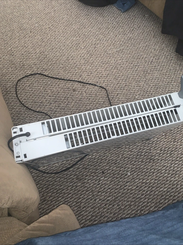 Delonghi Safe Heat 120V 60 Hz 1500W EW6507L Calentador de Espacio Eléctrico Lleno de Aceite Foto 3 de 4