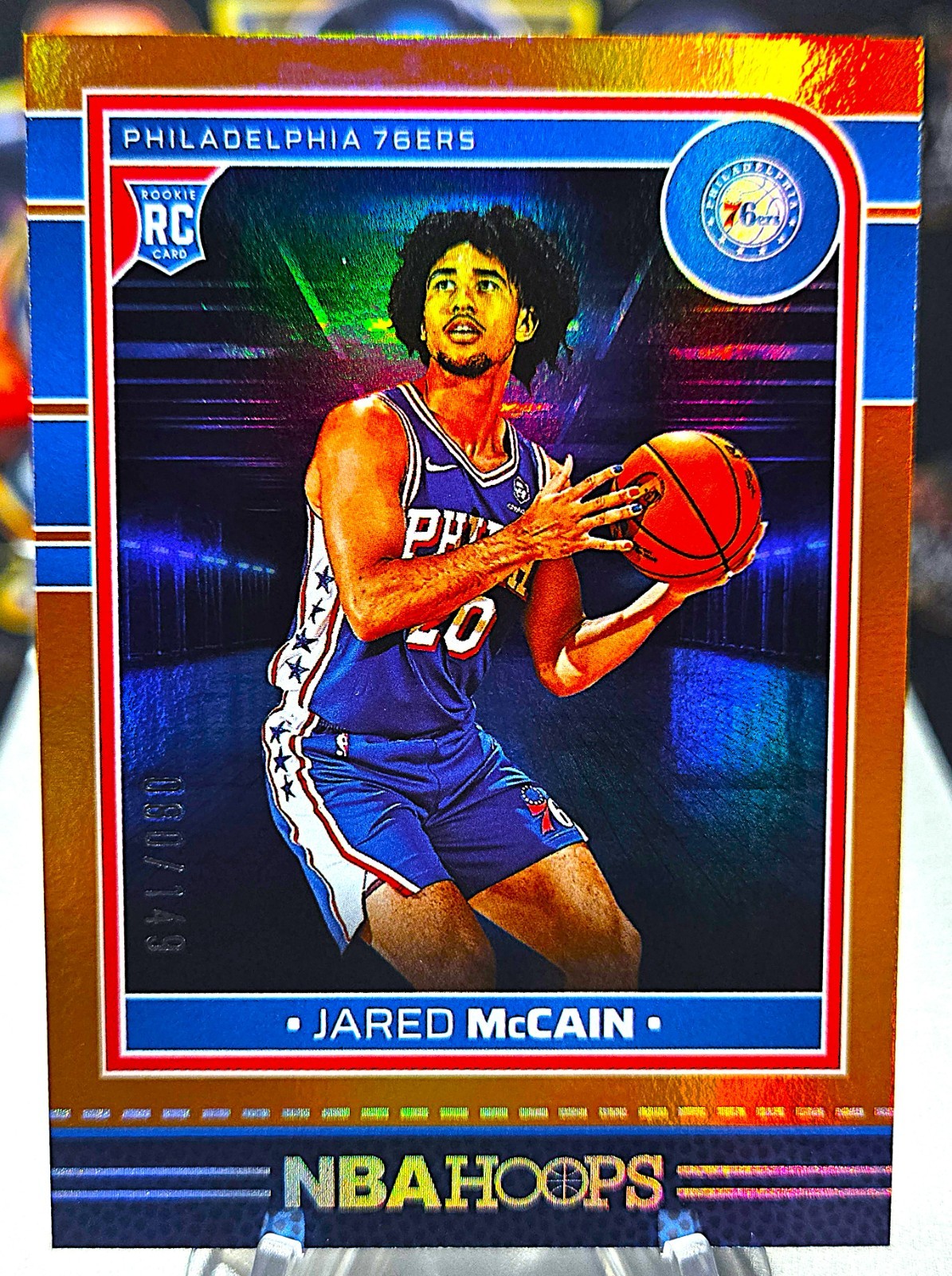 Jared McCain 2024-25 Panini NBA Hoops Orange /149 RC #246