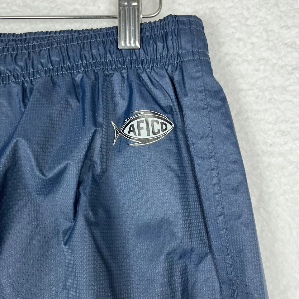 Pantalones cortavientos de pesca AFTCO Bluewater de nailon resistentes al agua para hombre pequeños Foto 2 de 4