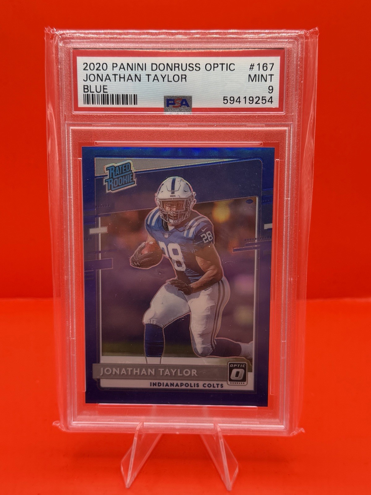 2020 Panini Donruss Optic - Rated Rookies Jonathan Taylor Blue Prizm /179 PSA 9