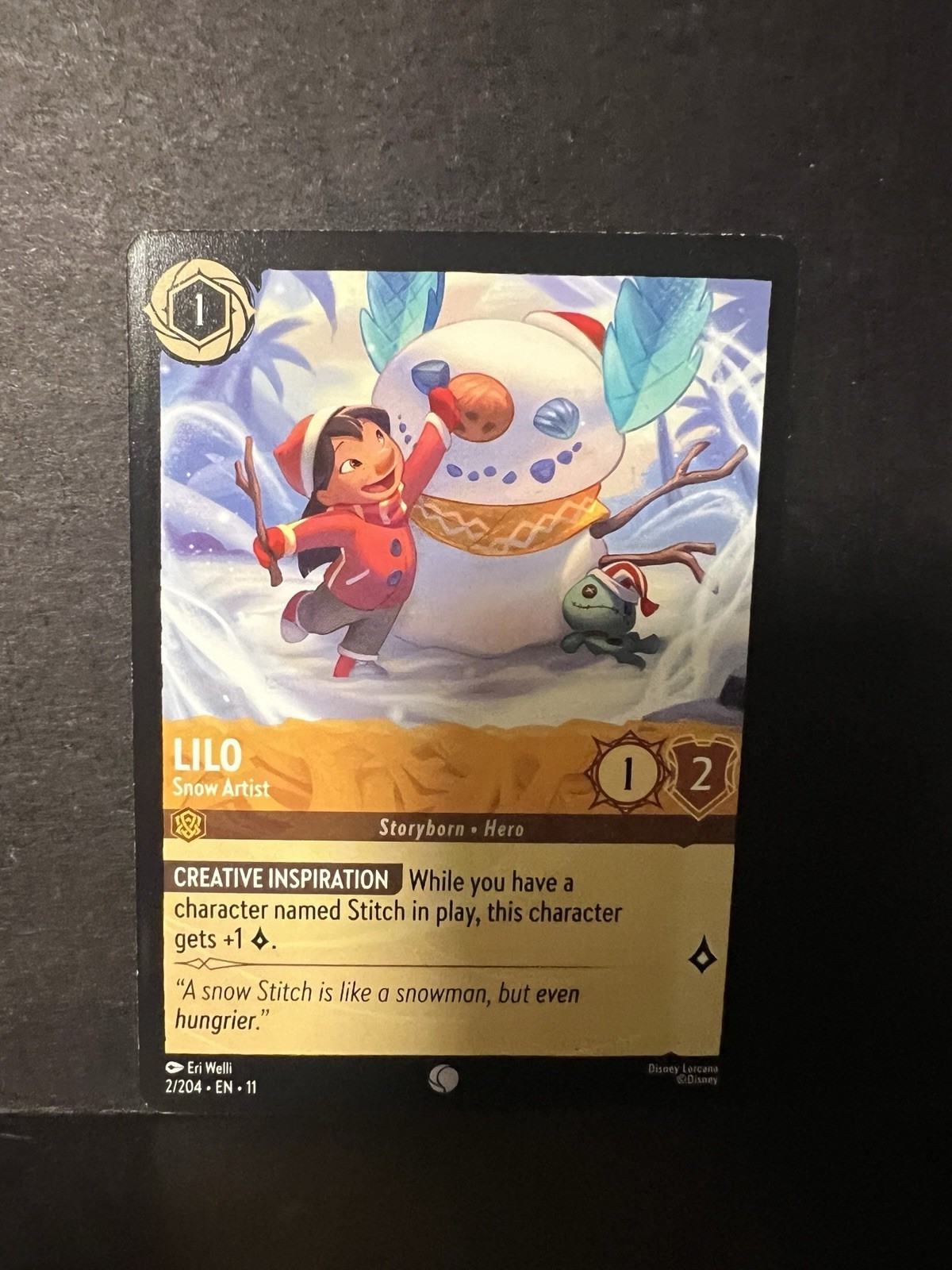 Lilo - Snow Artist 2/204 Common Winterspell Lorcana Near Mint