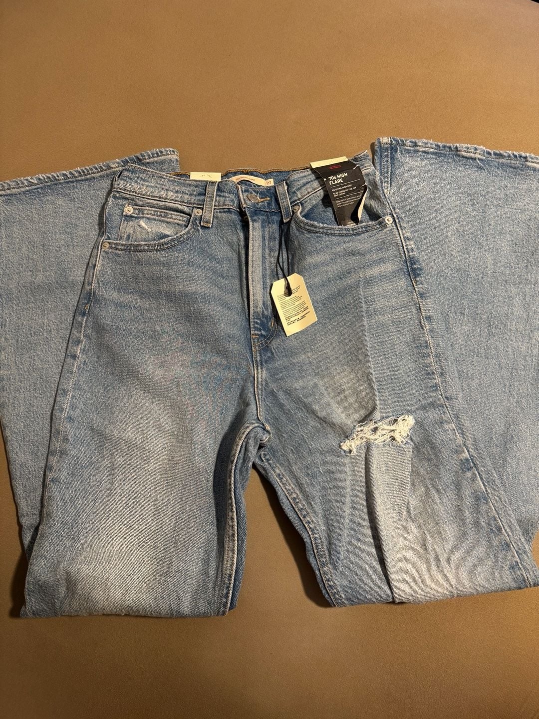 In Light Wash Distressed Blue