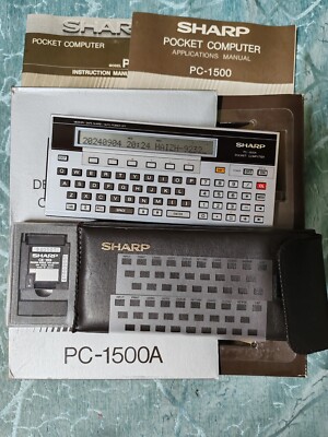 Vintage SHARP PC-1500A with CE-159 card and box, manuals in good condition