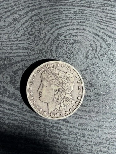 1891-CC Morgan Silver Dollar. Nice Strike And Color. Good Date!