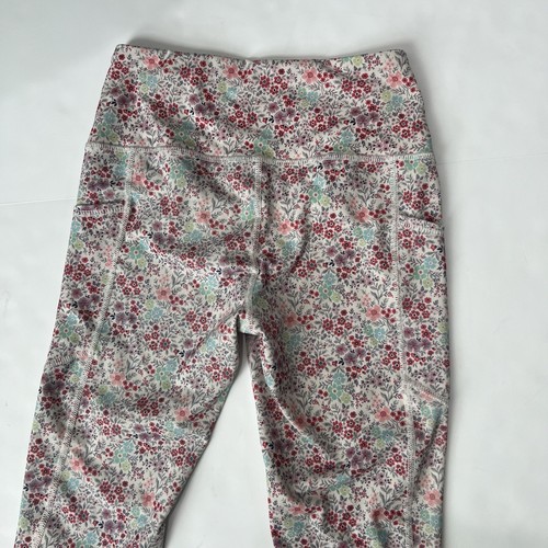 Set atletico evoluzione e creazione crop top racerback leggings neve giardino floreale - Foto 18 di 20