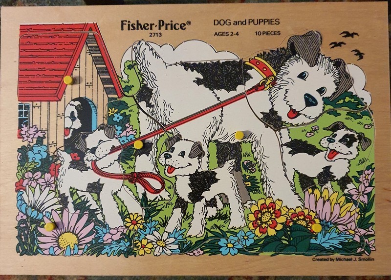 Vintage Fisher Price Pick up and peek, wood puzzle, DOGS. PUPPIES   Made in USA.