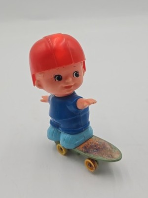 TOMY Wind Up Kid-A-Longs Toy Boy on Skateboard 1979