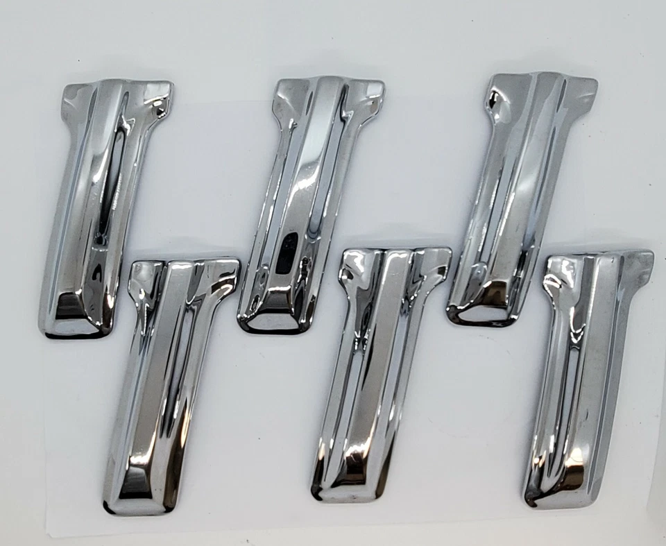 1955 道奇定制 Coronet 左球杆侧格栅栏镀铬帽 1599520 NOS。 — 第 3/4 张图片