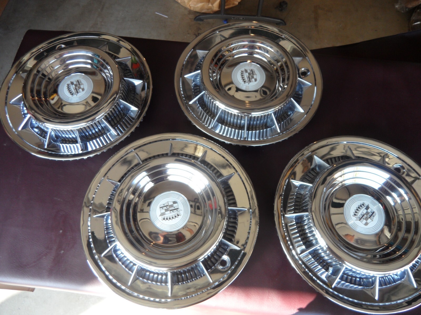 1959 1960 Cadillac Eldorado hubcaps (4) new meds restored & polished great eBay