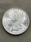 1885-P  BEAUTIFUL  UNCIRCULATED  MORGAN SILVER DOLLAR. 90% SILVER