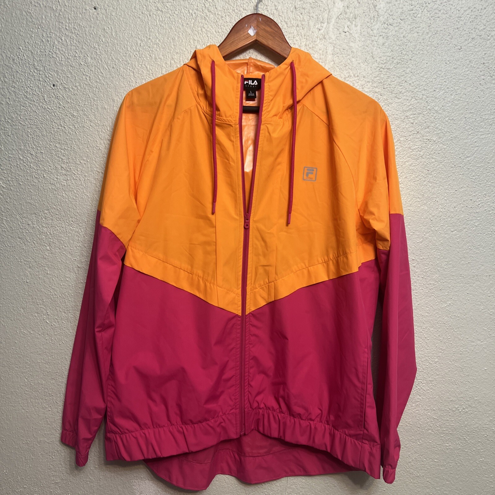 Giacca a vento Fila Sport grande unisex con cappuccio zip intera colore arancione rosa