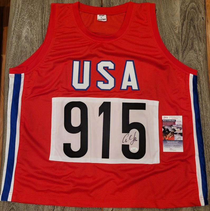 Carl Lewis  Signed Team USA Olympic Jersey (JSA COA)