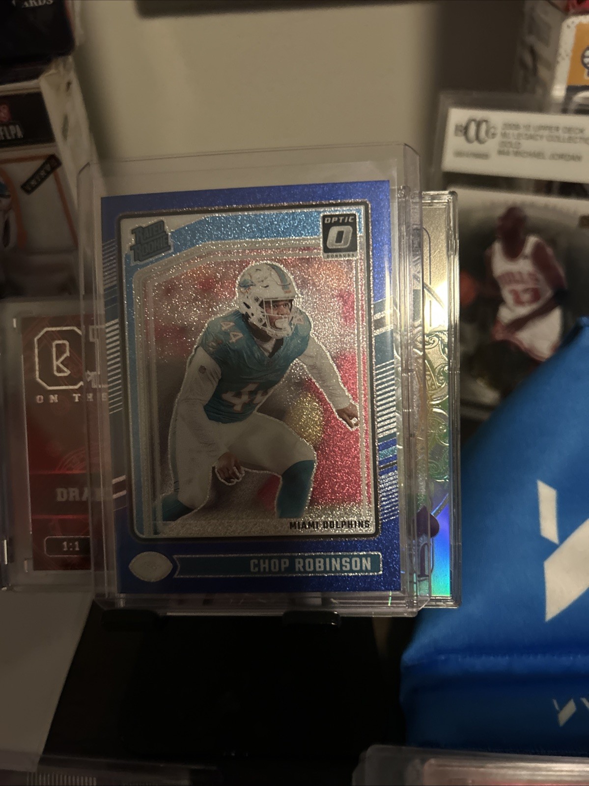 2024 Panini Donruss Optic - Rated Rookie Chop Robinson #219 Blue Glitter Prizm