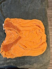 Brand new with tags. Leon Max Limited edition. Size medium. Orange in color.