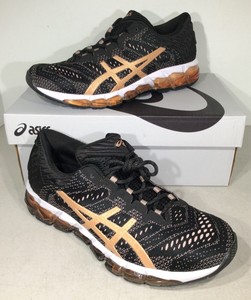 black and rose gold running shoes