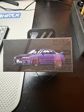 NISSAN SKYLINE GT-R R33 RHD VANCOUVER ED. 1/64 DIECAST BY POP RACE PR640425