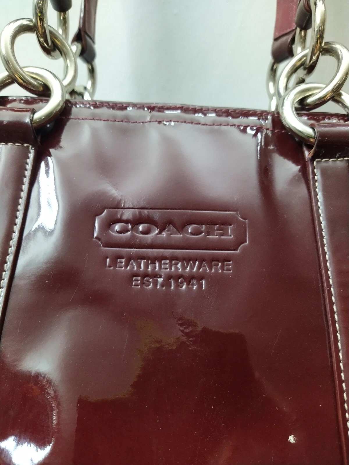 Borsa tote Coach Galaxy viola prugna in pelle verniciata tasca tunlock doppio manico