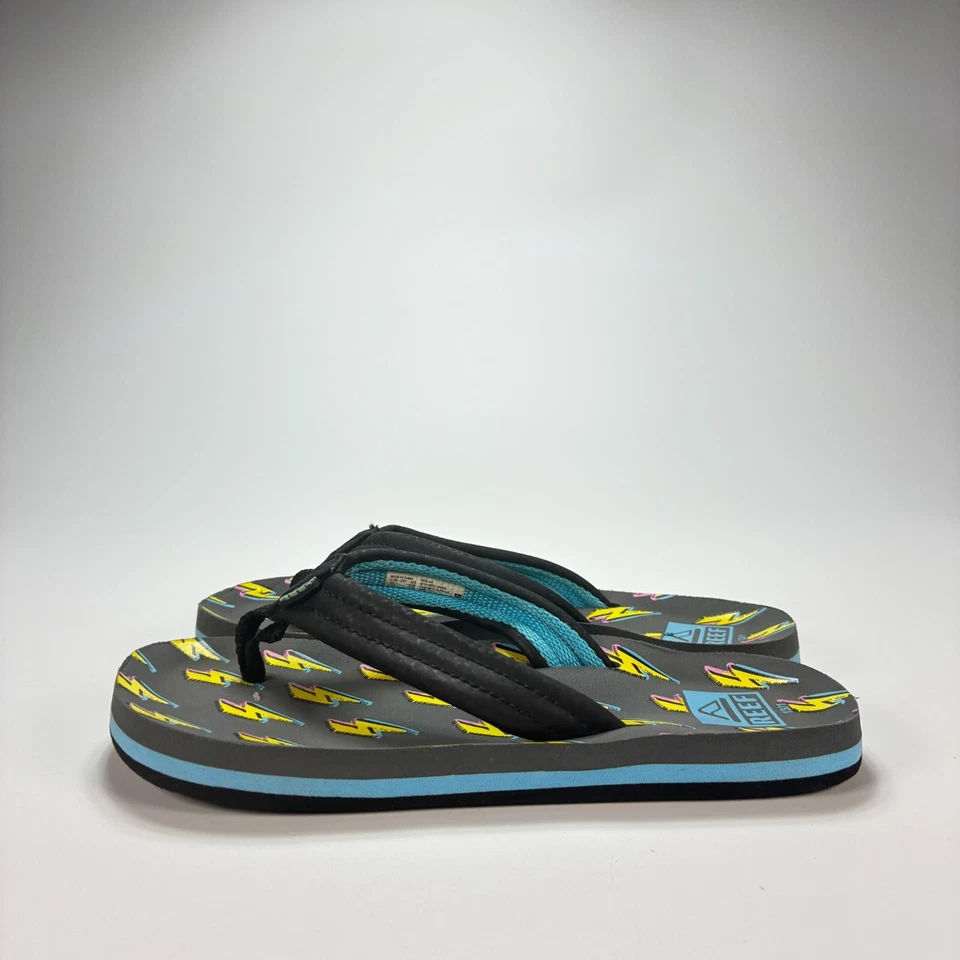 Chanclas Reef Kids Ahi Lightning Bolt Print Tanga Negra Piscina Playa Juvenil Talla 13 Foto 2 de 4