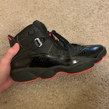 black and red jordan shoes